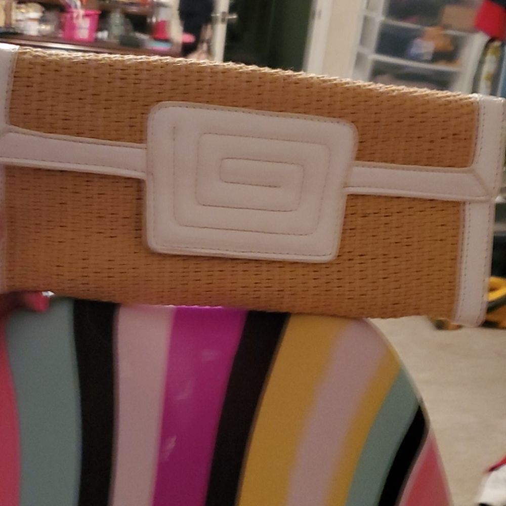 Sondra Robert’s White and wicker clutch.